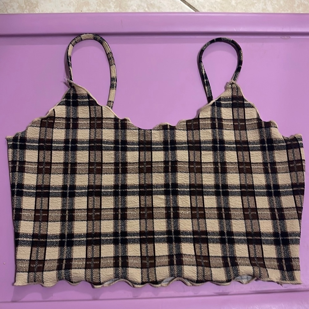 colors tan, brown, dark brown, and black. Size XL